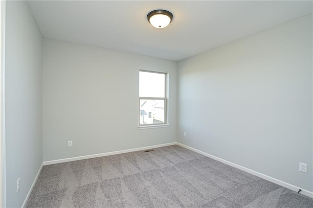 18256 W 166th St, Olathe, KS 66062 - spare room featuring carpet flooring and baseboards