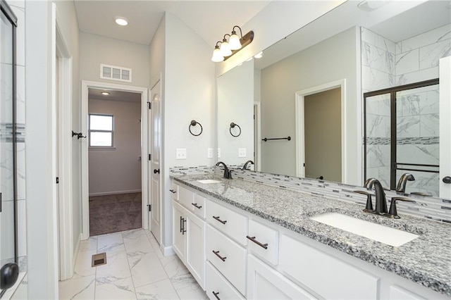 18256 W 166th St, Olathe, KS 66062 - bathroom with marble look tile flooring, a marble finish shower, and double vanity