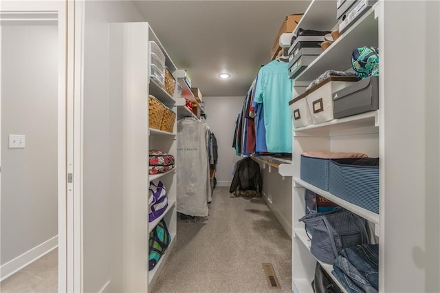 walk in closet with carpet flooring and visible vents