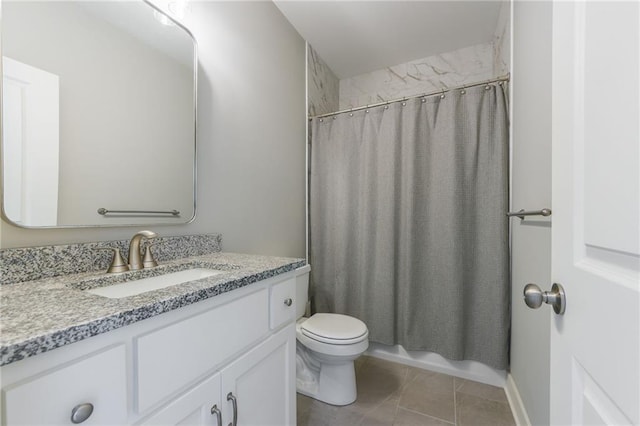 full bath with vanity, tile patterned floors, and toilet