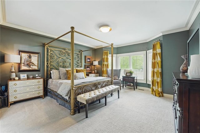 carpeted bedroom with baseboards and ornamental molding