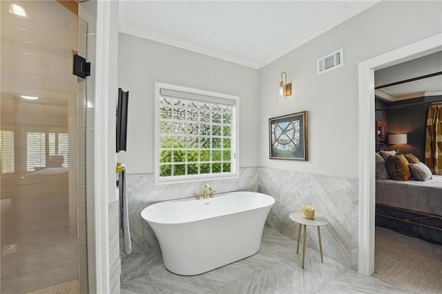 full bathroom featuring visible vents, a freestanding tub, tile walls, ensuite bath, and a tile shower