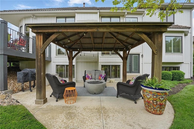 view of patio / terrace with grilling area, a gazebo, and outdoor lounge area