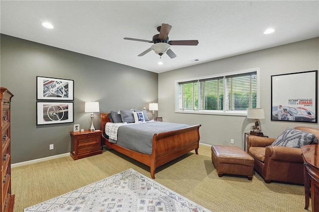 bedroom featuring a ceiling fan, visible vents, baseboards, light carpet, and recessed lighting