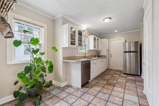 7227 Jefferson St, Kansas City, MO 64114 - kitchen featuring appliances with stainless steel finishes, a sink, white cabinetry, glass insert cabinets, and crown molding