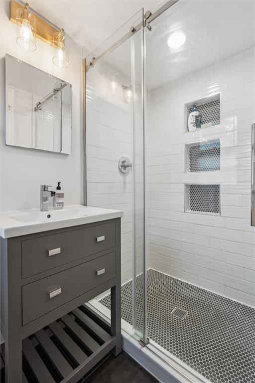 7227 Jefferson St, Kansas City, MO 64114 - bathroom with a shower stall and vanity