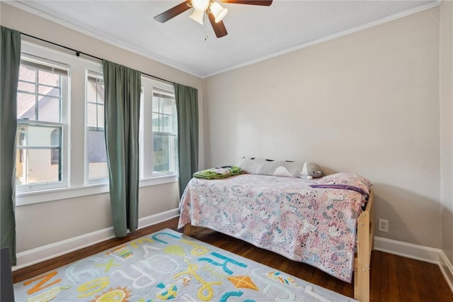 7227 Jefferson St, Kansas City, MO 64114 - bedroom featuring ornamental molding, wood finished floors, baseboards, and ceiling fan