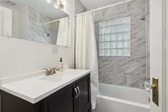 7227 Jefferson St, Kansas City, MO 64114 - bathroom featuring vanity and shower / tub combo