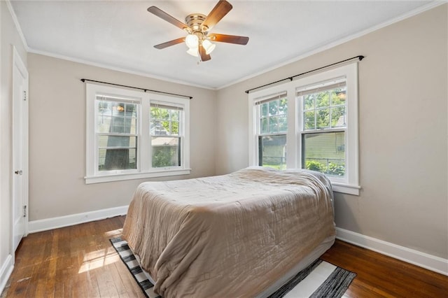 7227 Jefferson St, Kansas City, MO 64114 - bedroom featuring wood-type flooring, baseboards, ornamental molding, and ceiling fan