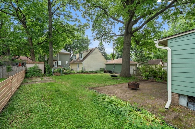 7227 Jefferson St, Kansas City, MO 64114 - view of yard with an outdoor fire pit