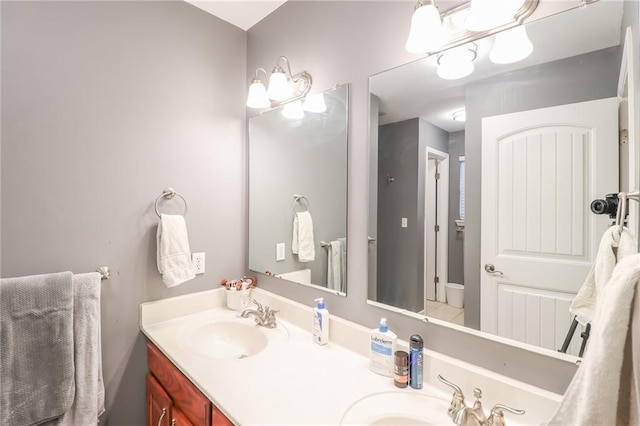 1215 Nottingham Dr, Warrensburg, MO 64093 - full bath with double vanity and a sink