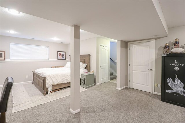 1215 Nottingham Dr, Warrensburg, MO 64093 - carpeted bedroom with baseboards