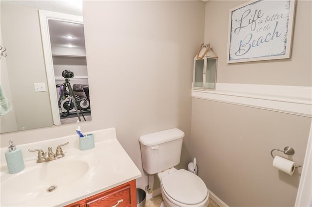 1215 Nottingham Dr, Warrensburg, MO 64093 - half bath featuring vanity and toilet