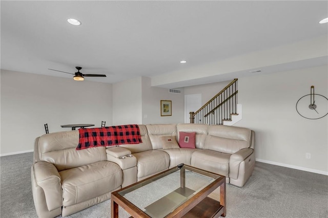 carpeted living area featuring baseboards, ceiling fan, recessed lighting, and visible vents