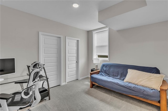 home office with baseboards and carpet
