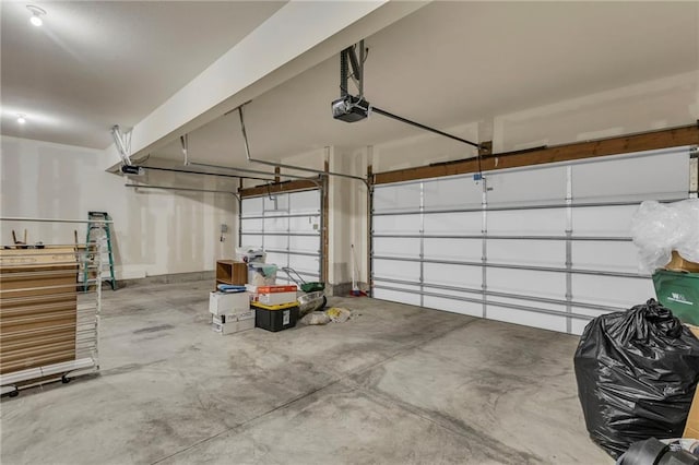 garage featuring a garage door opener