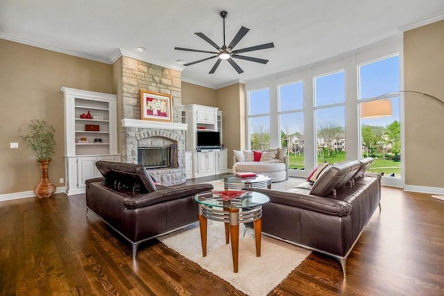 9705 Sunset Cir, Lenexa, KS 66220 - living area with ceiling fan, a wealth of natural light, crown molding, and wood finished floors