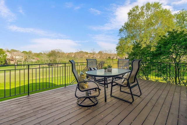 9705 Sunset Cir, Lenexa, KS 66220 - wooden terrace featuring a yard and outdoor dining area
