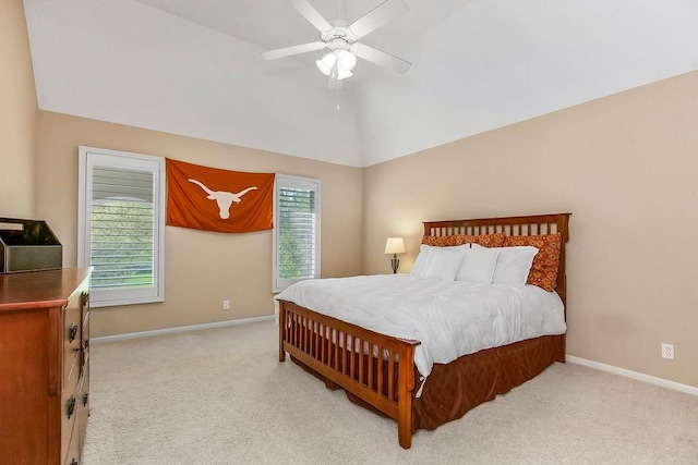9705 Sunset Cir, Lenexa, KS 66220 - carpeted bedroom with vaulted ceiling, baseboards, and a ceiling fan