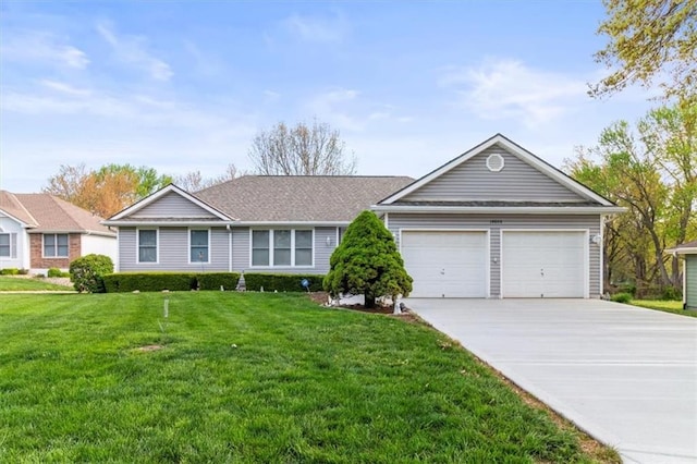 ranch-style home featuring concrete driveway, an attached garage, and a front lawn