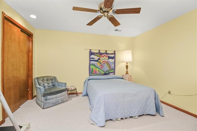 carpeted bedroom featuring recessed lighting, visible vents, baseboards, and ceiling fan