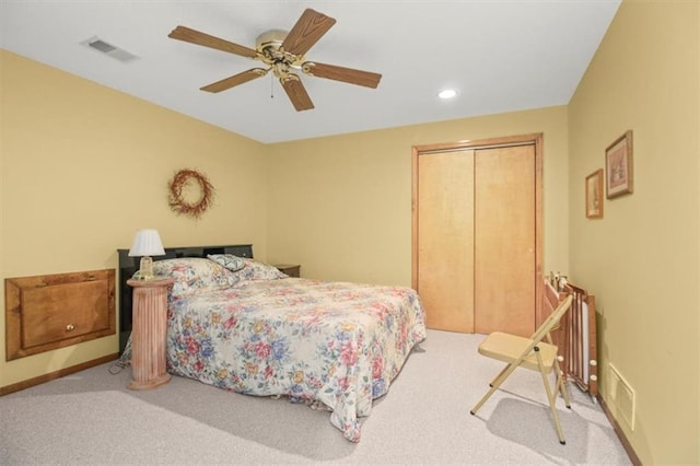 carpeted bedroom with visible vents, recessed lighting, a closet, and ceiling fan
