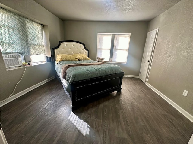 118-148 N Lawn Ave, Kansas City, MO 64123 - bedroom with baseboards, wood finished floors, and multiple windows