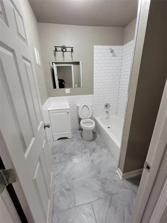 118-148 N Lawn Ave, Kansas City, MO 64123 - full bath with bathtub / shower combination, tile walls, vanity, and toilet