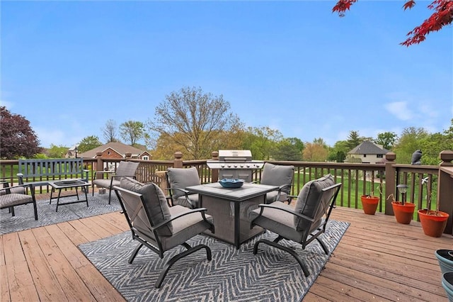 deck featuring a grill