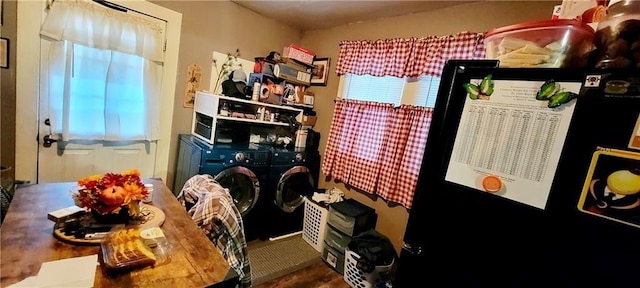 124 W 3rd Ave, Garnett, KS 66032 - clothes washing area featuring washer and clothes dryer and laundry area