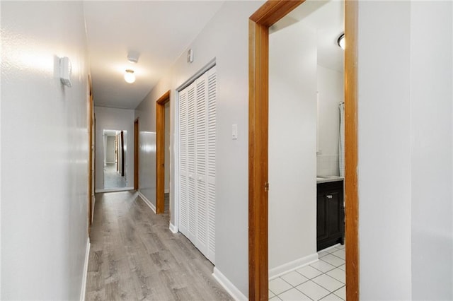 1804 Kenmar Dr, Manhattan, KS 66502 - corridor featuring light wood-type flooring and baseboards