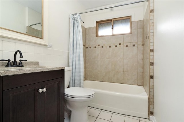 1804 Kenmar Dr, Manhattan, KS 66502 - bathroom with tile patterned flooring, toilet, shower / bathtub combination with curtain, vanity, and backsplash