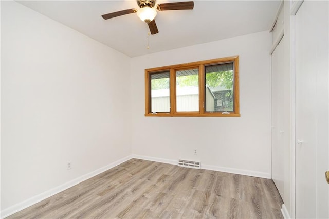 1804 Kenmar Dr, Manhattan, KS 66502 - empty room featuring light wood-style flooring, baseboards, and a ceiling fan