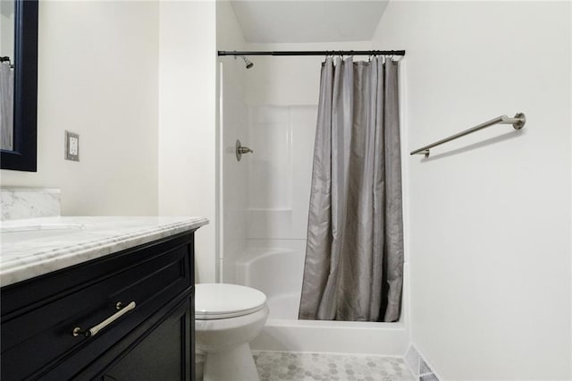 1804 Kenmar Dr, Manhattan, KS 66502 - bathroom with toilet, a stall shower, vanity, and tile patterned floors
