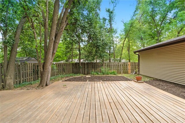 1804 Kenmar Dr, Manhattan, KS 66502 - wooden terrace featuring a fenced backyard