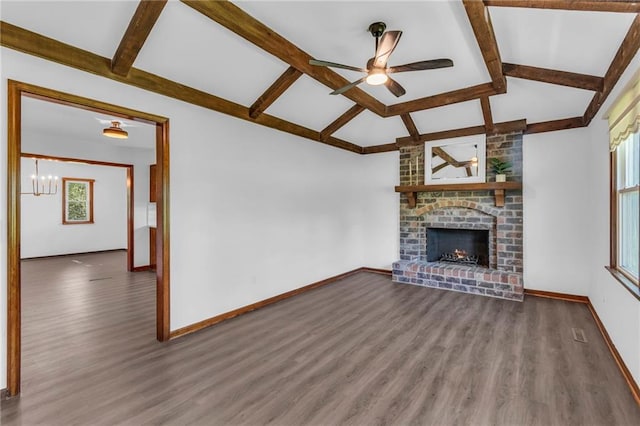 unfurnished living room with wood finished floors, a ceiling fan, baseboards, and a fireplace