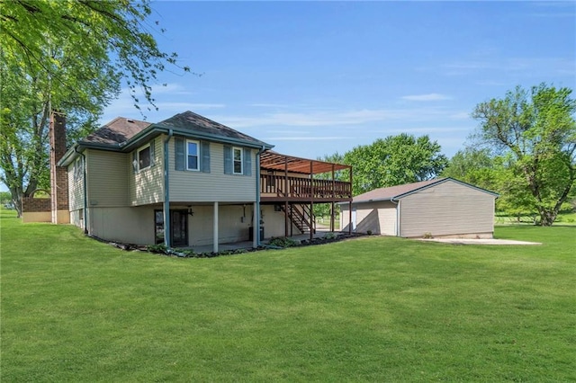 rear view of house featuring stairs, a wooden deck, a lawn, and a chimney