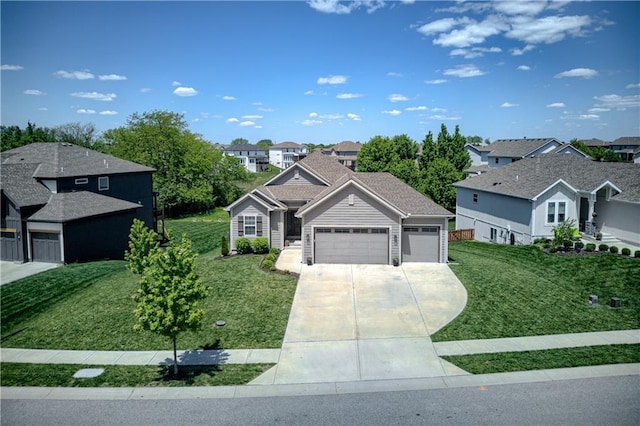 view of front facade featuring an attached garage, driveway, a front lawn, and a residential view