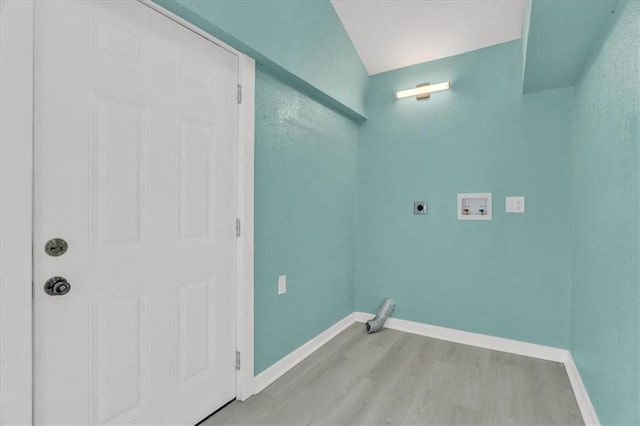 2723 Kimball Ave, Kansas City, KS 66104 - laundry room with hookup for a washing machine, laundry area, light wood-style flooring, hookup for an electric dryer, and baseboards