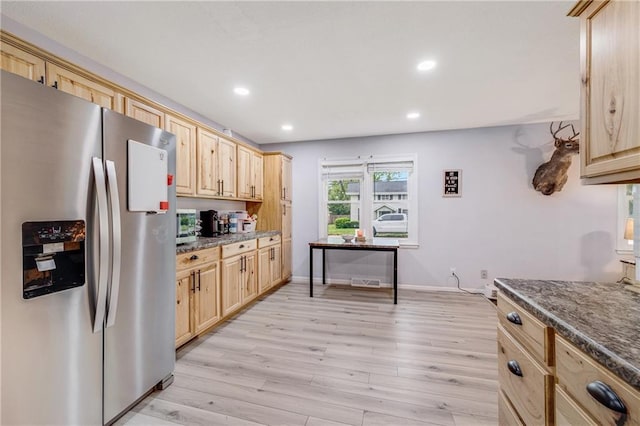 312 W Pine St, Butler, MO 64730 - kitchen featuring stainless steel refrigerator with ice dispenser, light brown cabinetry, light wood-style floors, recessed lighting, and baseboards