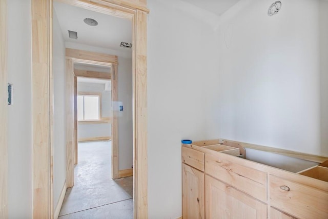 bathroom with concrete flooring