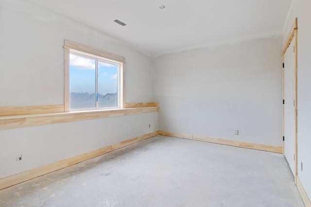 empty room with concrete floors