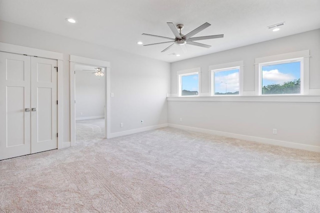 1811 Halls Creek Ave, Raymore, MO 64083 - unfurnished bedroom featuring carpet flooring, recessed lighting, ceiling fan, and a closet