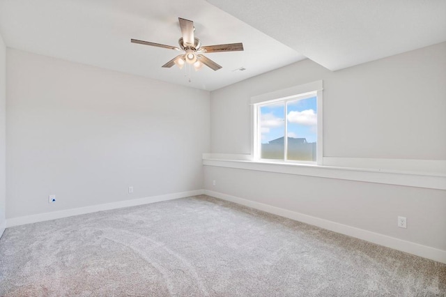 1811 Halls Creek Ave, Raymore, MO 64083 - empty room with carpet and a ceiling fan