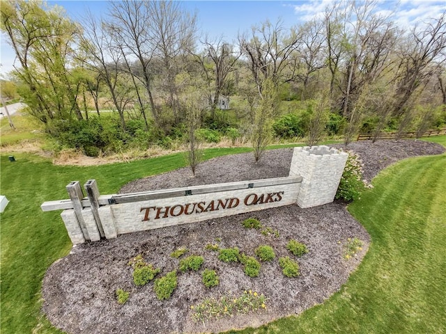 5566 Thousand Oaks Dr, Parkville, MO 64152 - community / neighborhood sign featuring a yard