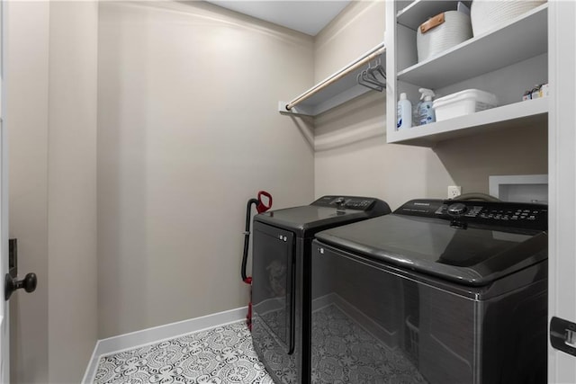 5566 Thousand Oaks Dr, Parkville, MO 64152 - laundry room featuring baseboards, tile patterned floors, laundry area, and independent washer and dryer