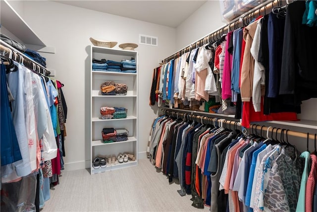 5566 Thousand Oaks Dr, Parkville, MO 64152 - walk in closet featuring visible vents and carpet