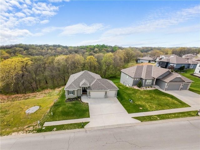 5566 Thousand Oaks Dr, Parkville, MO 64152 - drone / aerial view with a wooded view