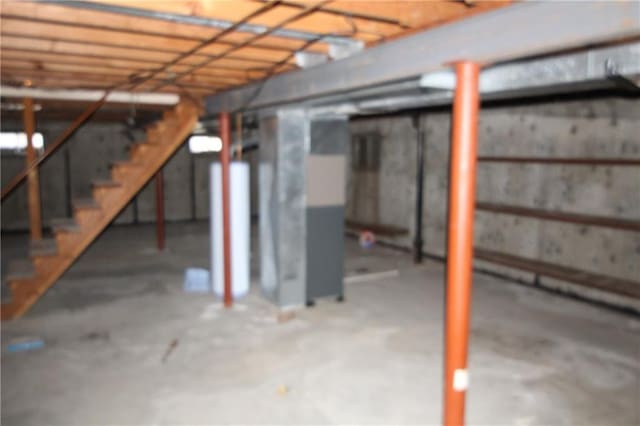 unfinished basement with stairs