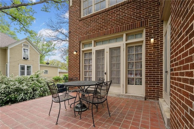 view of patio featuring outdoor dining area